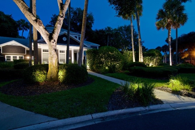 landscape lighting in front yard of a house 
